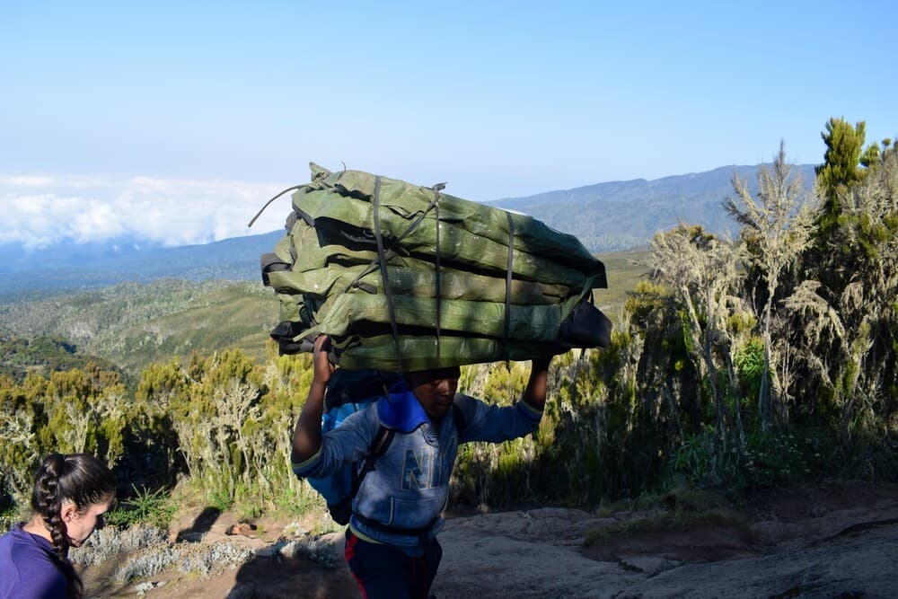 Porters carrying kit